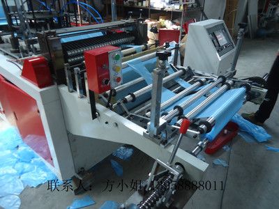 薄膜圍裙機(jī) 暢銷一次性即拋防水防污圍裙機(jī)